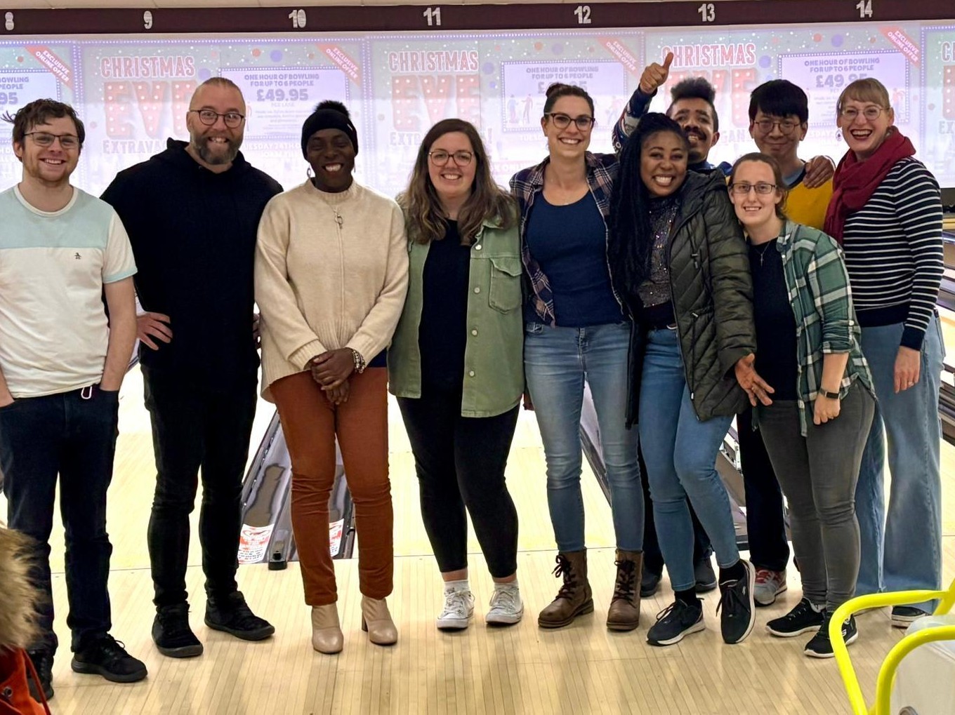 The Olive Branch volunteer team together at a bowling alley