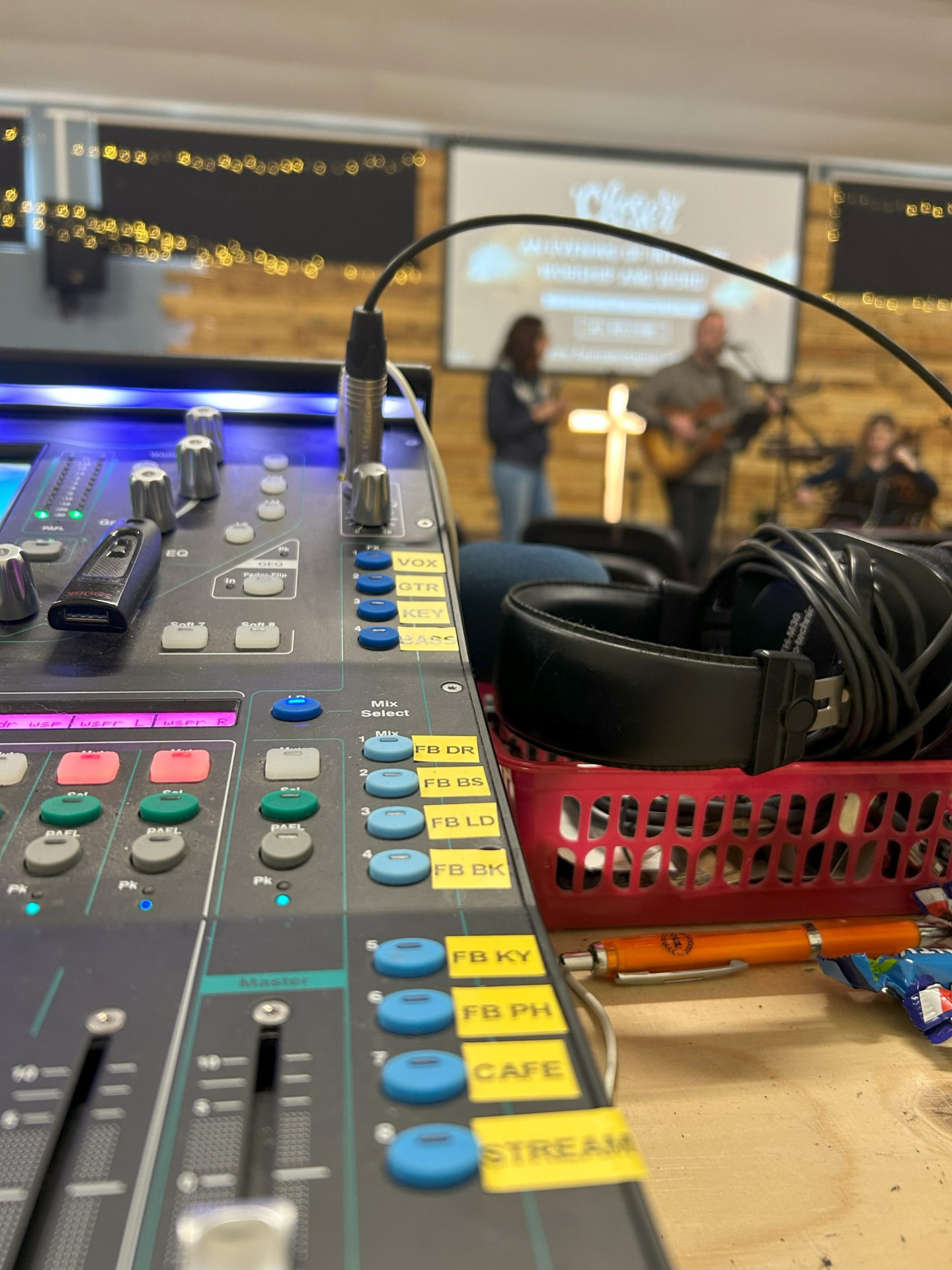 Sound desk at the back of a Sunday gathering