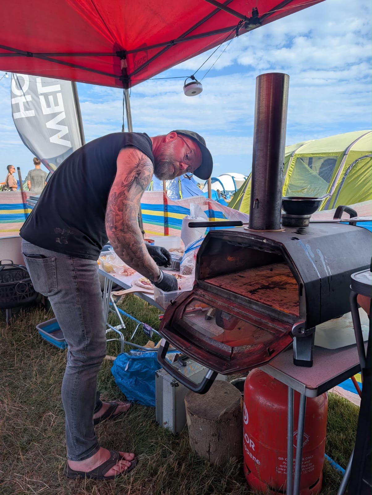Pizza being cooked at a camping weekend